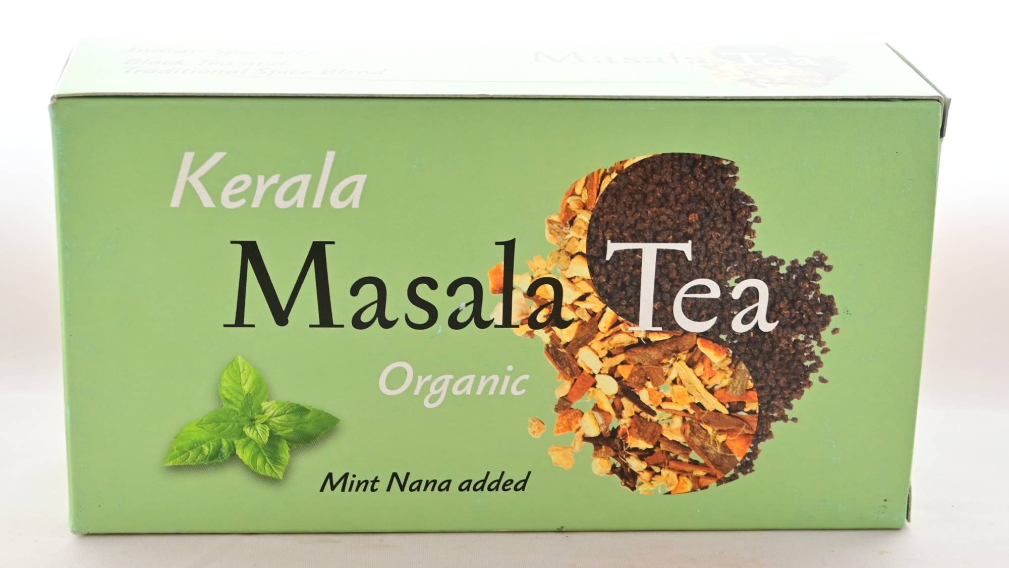 The Kerala Masala Tea box is pastel green. It features masala spices and rolled black tea together in a yin-yang shape, with Mint Nana leaves toward the bottom left. Text reads: "Kerala. Masala Tea. Organic. Mint Nana added."