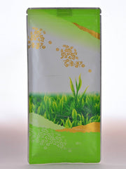 The Sencha packet is featured, showing a mostly-green package with gold-painted moutains and flowers. The image in the center is of a tea plant with new growth.