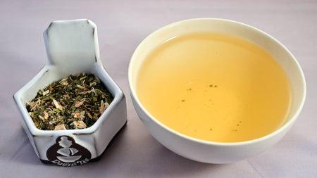 A side-by-side comparison of the Throat Juice blend and steeped tisane. On the left, the herbal blend prominently features echinacea and licorice root. On the right, the steeped tisane is a pale orange.