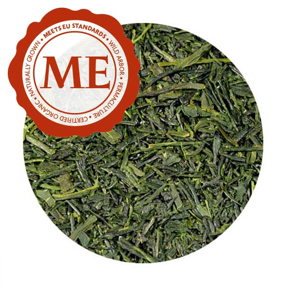 A close-up of Sencha leaves. They are vibrant, deep green, flat, and crisp. They have a Meets EU Standards certification.